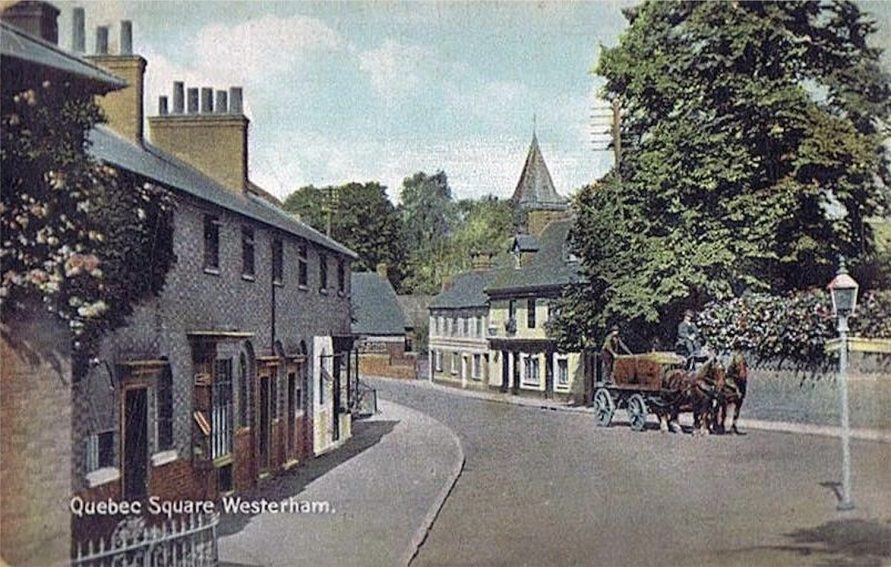 The view from West Lodge up Vicarage Hill shows retail trade at this end of town. The first shop in the foreground-left is a little grocer's shop, then the white painted frontage was a pork butcher's shop run by William Dove. Opposite and further up can be seen 'The Old House Inn' with adjoining cottages which are no longer there.